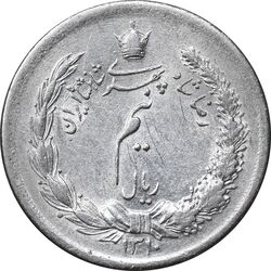 سکه نیم ریال 1310 - AU50 - رضا شاه
