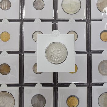 سکه 2000 دینار 1315 خطی (سورشارژ روی دوقران) - VF20 - مظفرالدین شاه