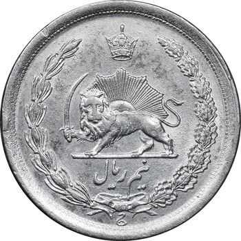 سکه نیم ریال 1310 - AU50 - رضا شاه