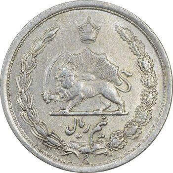سکه نیم ریال 1310 - AU55 - رضا شاه