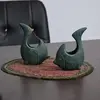 ظرف سفالی پتینه مدل ماهی در چیدمان
