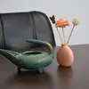 چراغ پیه سوز سفالی پتینه در چیدمان