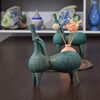 مجسمه سفالی پتینه طرح گوزن مارلیک در چیدمان