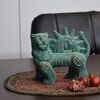 مجسمه سفالی پتینه شیر و خورشید در چیدمان