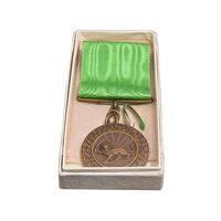 مدال برنز بپاداش خدمت (با روبان و جعبه فابریک) - UNC - رضا شاه
