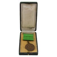 مدال برنز بپاداش خدمت (با جعبه و روبان فابریک) - UNC - رضا شاه