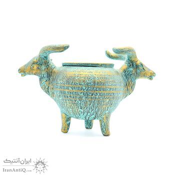 ظرف سفالی پتینه با طرح دو سر گاو