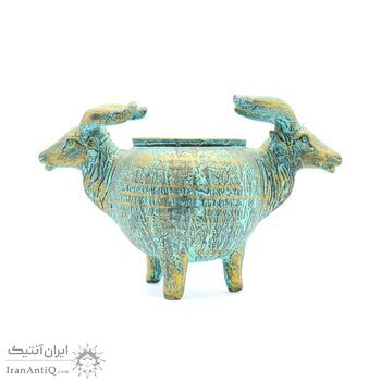 ظرف سفالی پتینه با طرح دو سر گاو