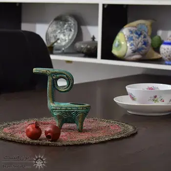 جاشمعی سفالی پتینه مدل بز شاخ پیچان در چیدمان