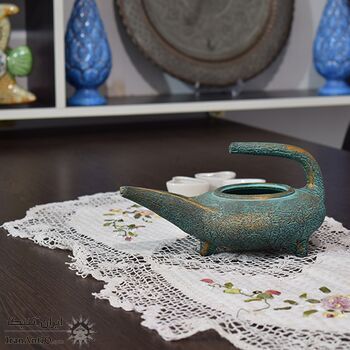 چراغ پیه سوز سفالی پتینه در چیدمان