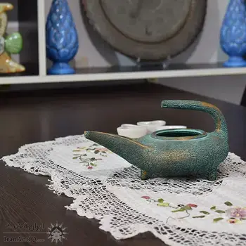 چراغ پیه سوز سفالی پتینه در چیدمان