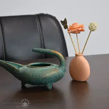 چراغ پیه سوز سفالی پتینه در چیدمان