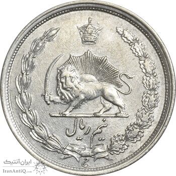 سکه نیم ریال 1313 - 3 تاریخ بزرگ - AU58 - رضا شاه سکه نیم ریال 1313 - 3 تاریخ بزرگ - AU58 - رضا شاه