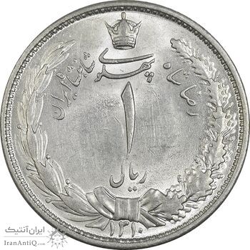 سکه 1 ریال 1310 - MS62 - رضا شاه سکه 1 ریال 1310 - MS62 - رضا شاه