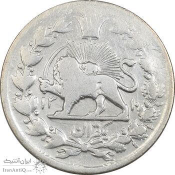 سکه 1 قران 1310 - VF30 - ناصرالدین شاه سکه 1 قران 1310 - VF30 - ناصرالدین شاه