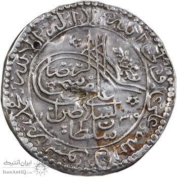 سکه پولکی نقره امام رضا (ع) 1319 - VF - مظفرالدین شاه سکه پولکی نقره امام رضا (ع) 1319 - VF - مظفرالدین شاه