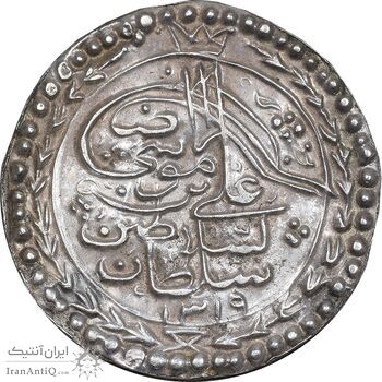 سکه نقره پولکی امام رضا (ع) 1319 - AU - مظفرالدین شاه