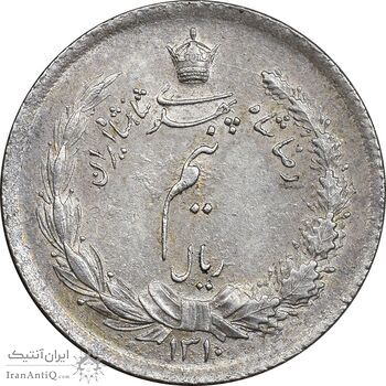 سکه نیم ریال 1310 - MS64 - رضا شاه سکه نیم ریال 1310 - MS64 - رضا شاه