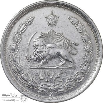 سکه نیم ریال 1312 - EF - cleaned - رضا شاه