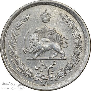 سکه نیم ریال 1310 - AU55 - رضا شاه