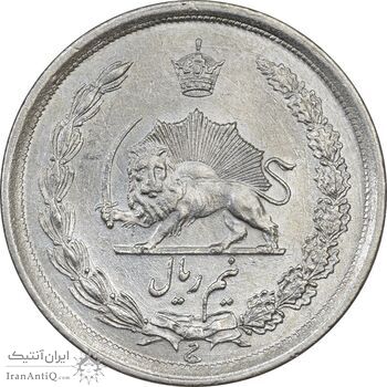 سکه نیم ریال 1310 - AU58 - رضا شاه
